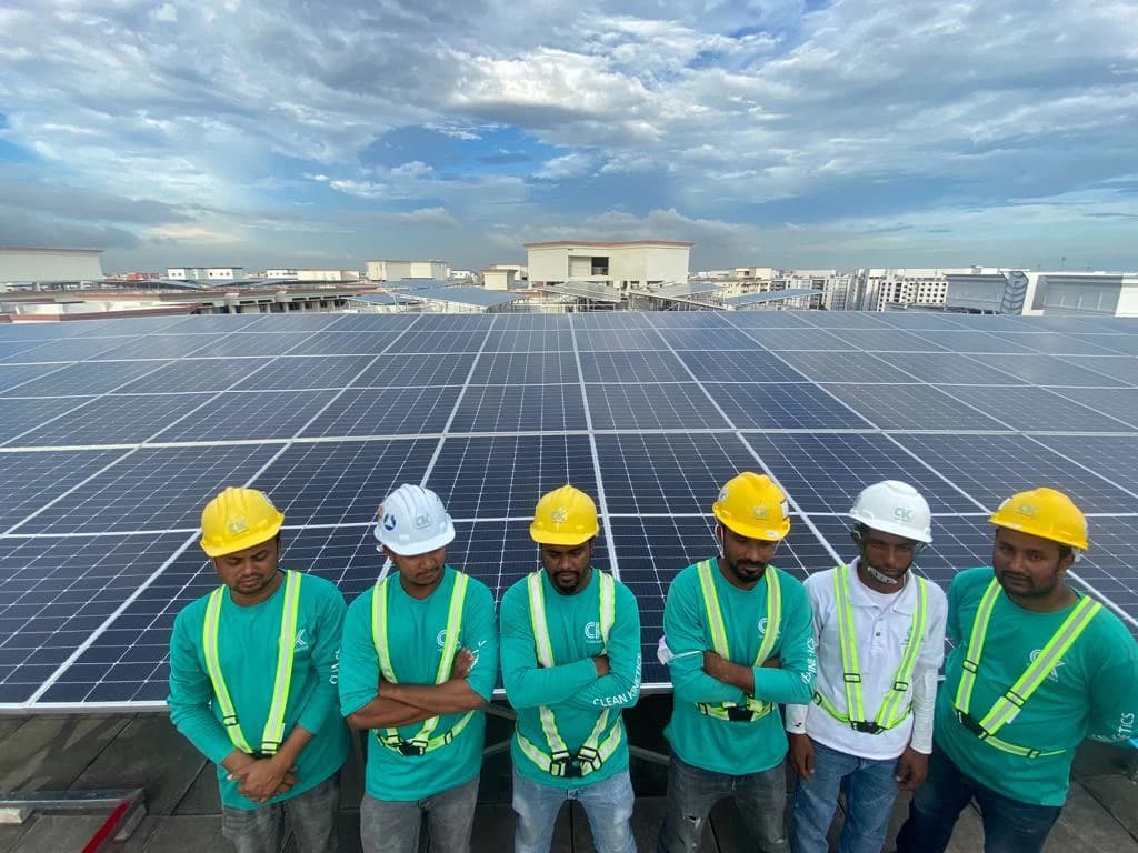Residential solar — workers on HDB rooftop